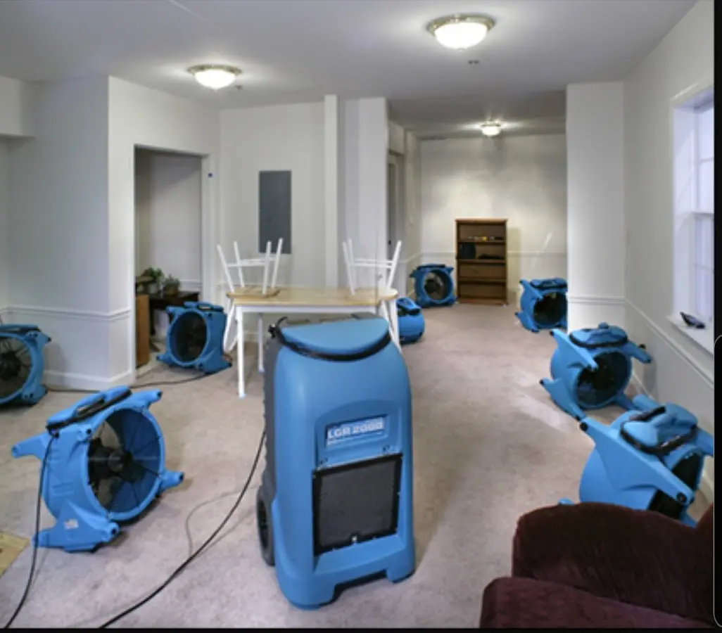 Air movers and dehumidifier setup for Water Damage Restoration in Greenfield
